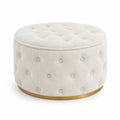 Reposapiés redondo de tela beige con base de metal dorado